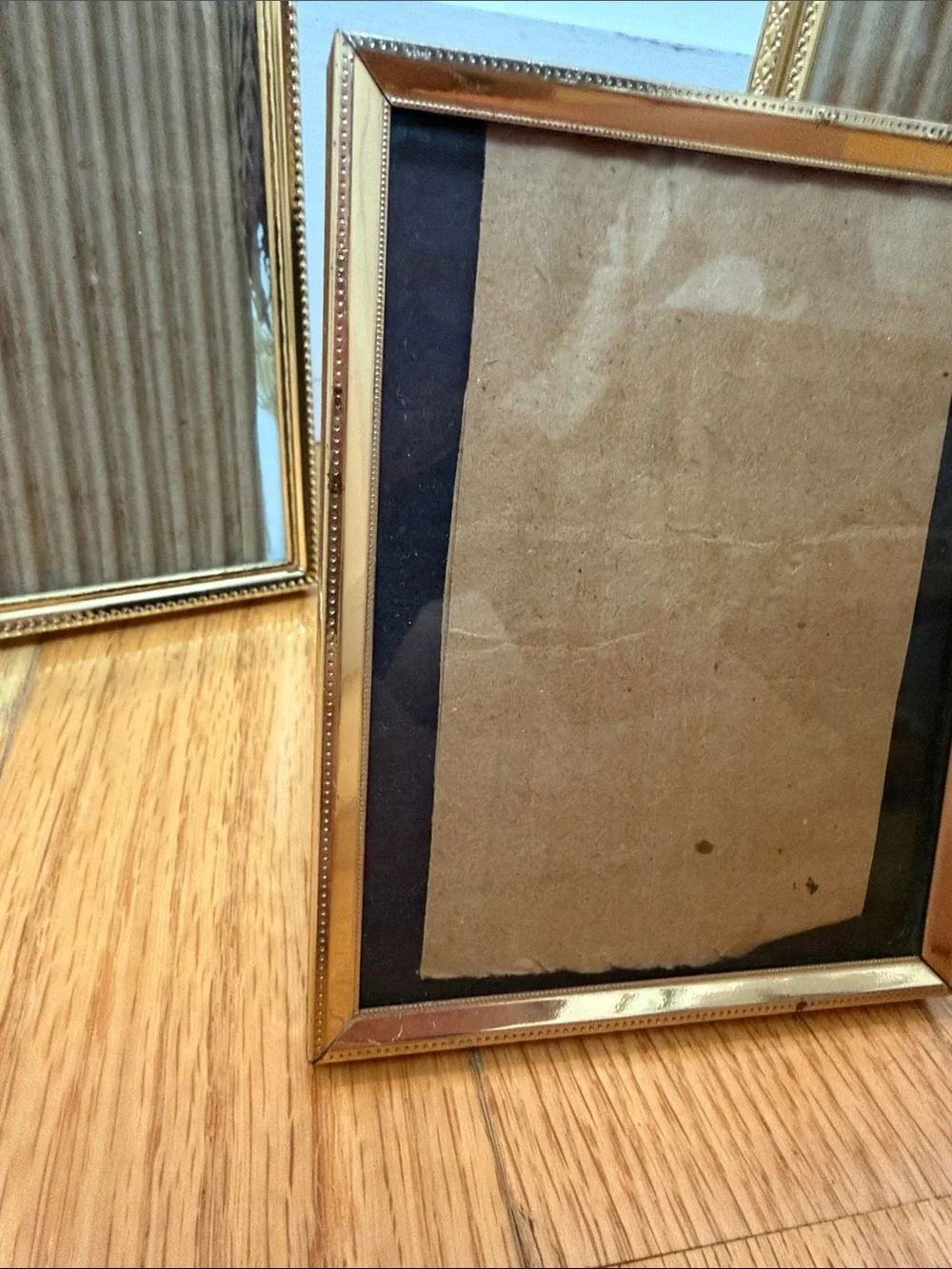 Set of three vintage gold table picture frames. 2x 5x7, 1x 4x6
